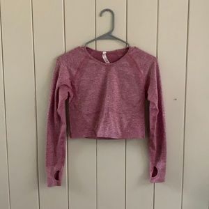 Pink long sleeve cropped athletic top